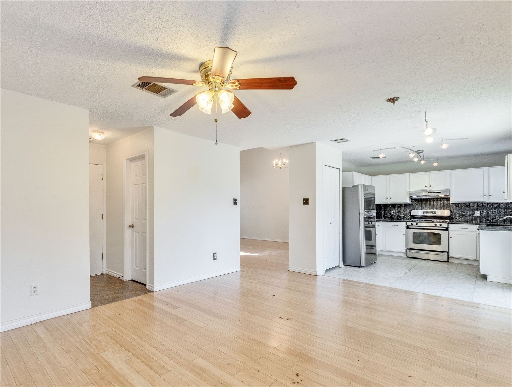 3600 Cheyenne Street Round Rock, TX 78665 - Photo 5 of 36 a view of an empty room and kitchen view