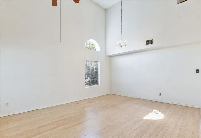 a view of room and hardwood floor
