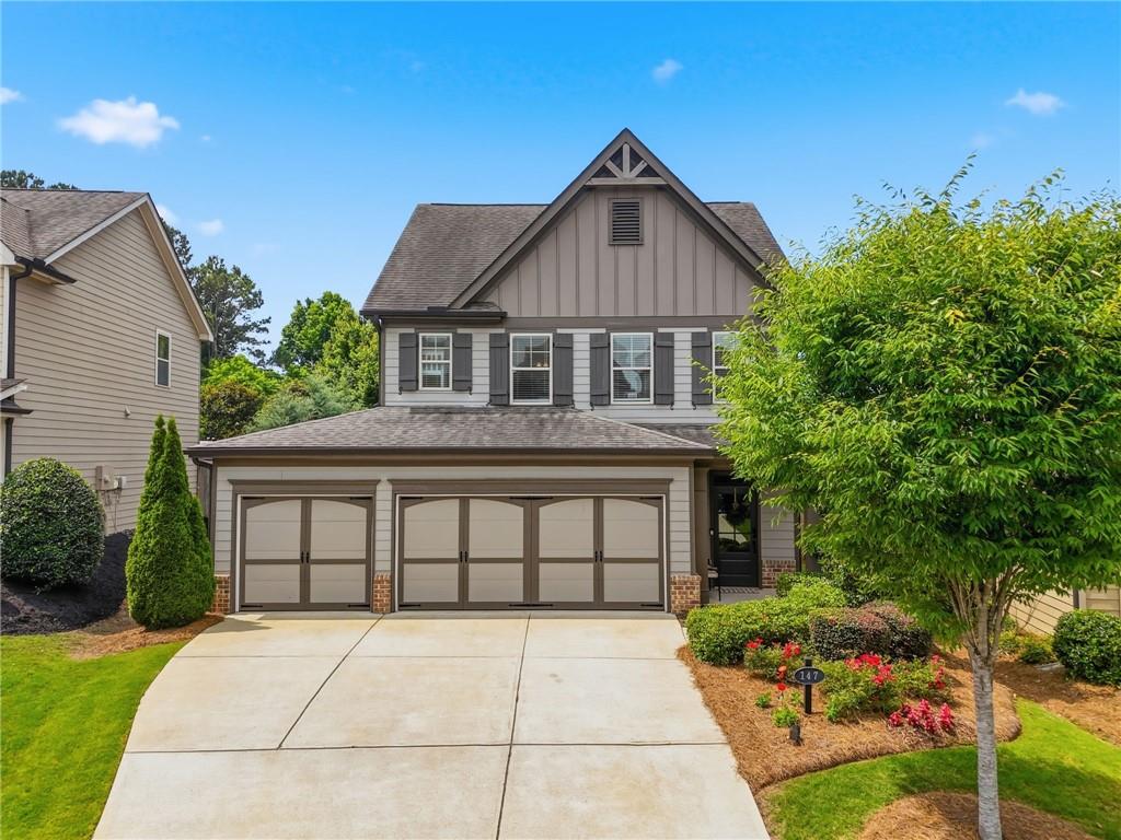 147 Fieldbrook Crossing Canton, GA 30115 - Photo 38 of 46 a front view of a house with a garden