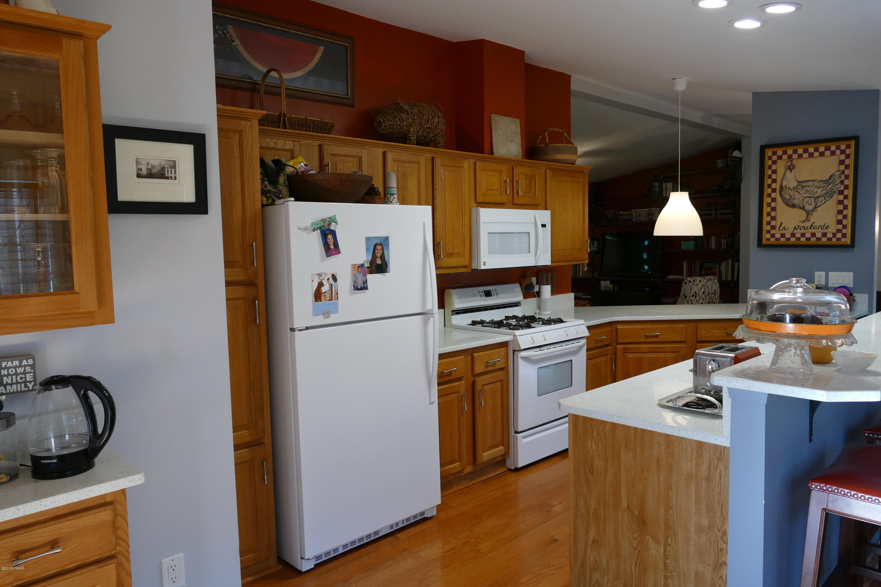 108 Savitz Road Moscow, PA 18444 - Photo 25 of 46 a kitchen with stainless steel appliances granite countertop a refrigerator and a stove top oven