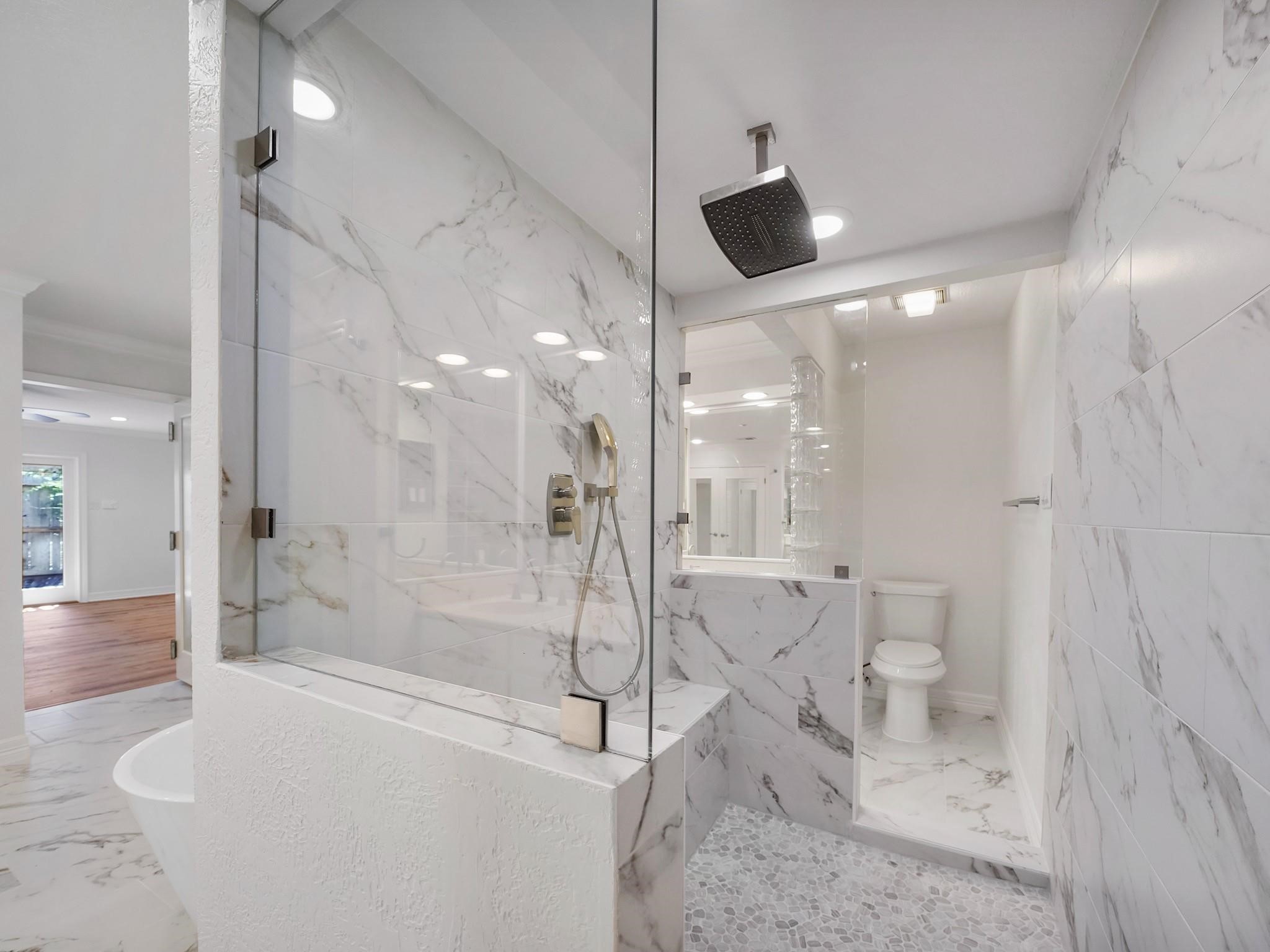 910 Enclave Parkway Houston, TX 77077 - Photo 21 of 42 Separate shower plus two water closets provide comfort and convenience.