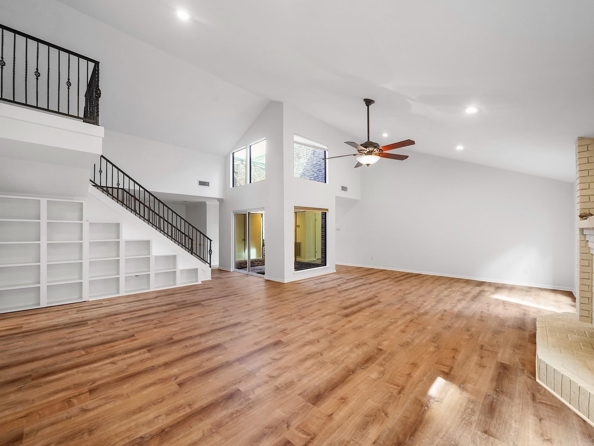 910 Enclave Parkway Houston, TX 77077 - Photo 6 of 42 Move-in ready with a clean, neutral palette that complements any décor. Throughout the main spaces: brand-new luxury vinyl plank—stylish, durable, and pet-friendly.