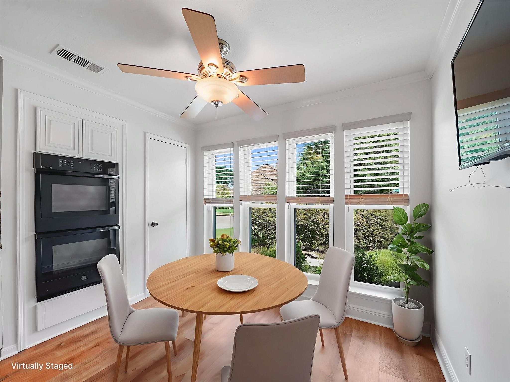 910 Enclave Parkway Houston, TX 77077 - Photo 8 of 42 A virtually staged picture of the kitchen. Double ovens ready for holiday baking and batch cooking.