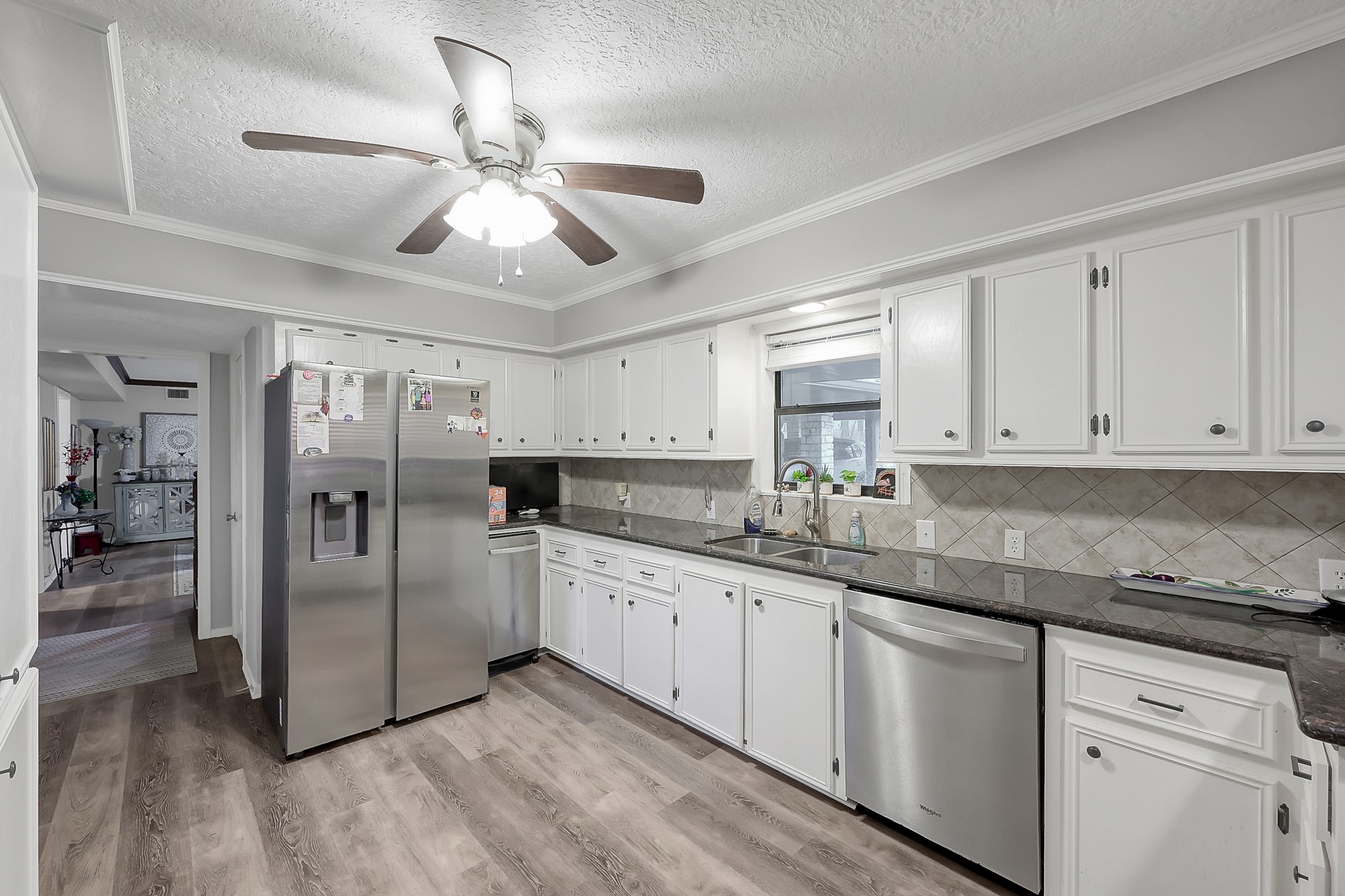 80 Nettie Phillips Road Coldspring, TX 77331 - Photo 13 of 49 Additional View of the Kitchen with access to the Living Area