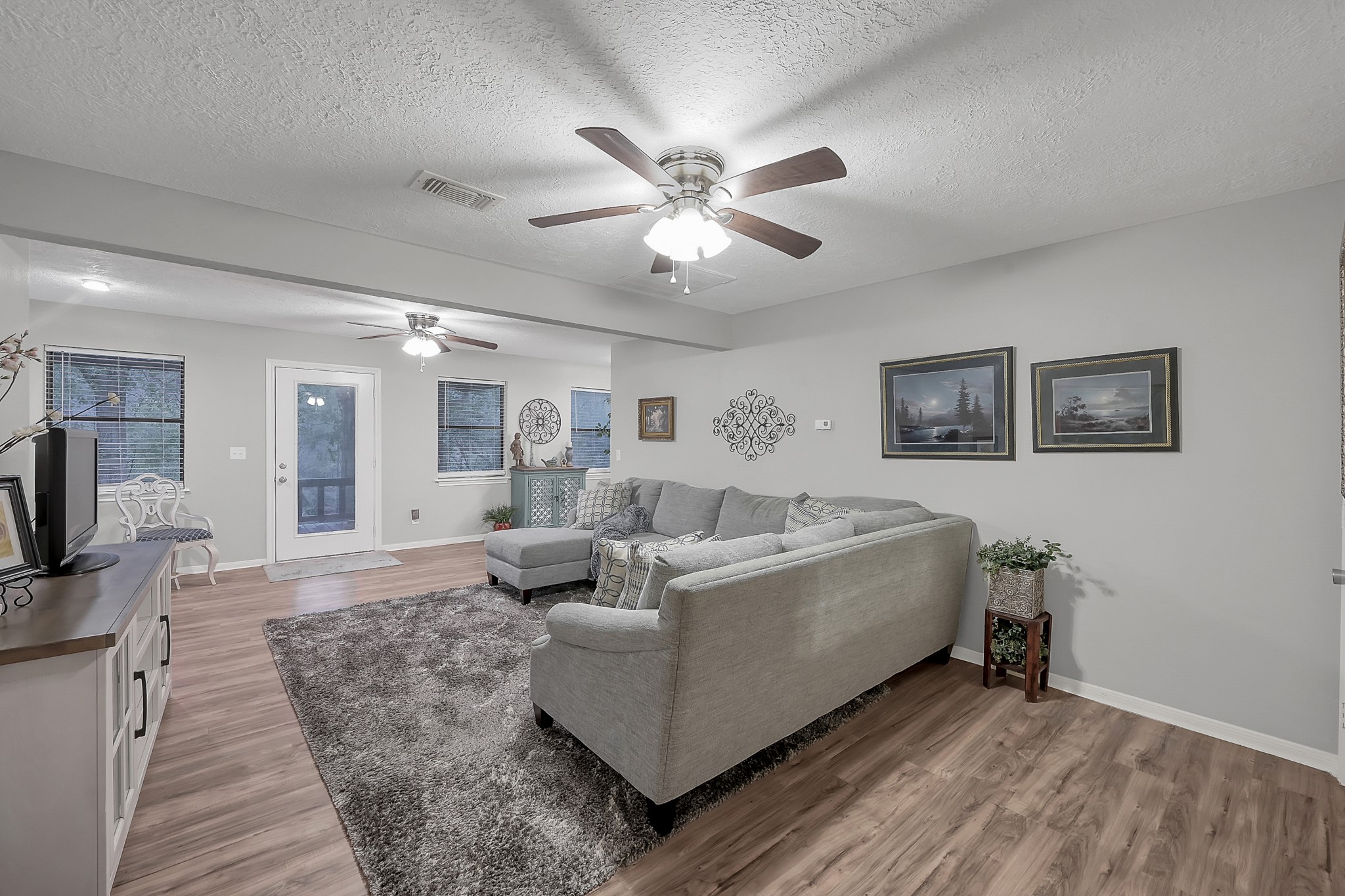 80 Nettie Phillips Road Coldspring, TX 77331 - Photo 19 of 49 Upstairs Living Area with generous spaces for games and activities.
