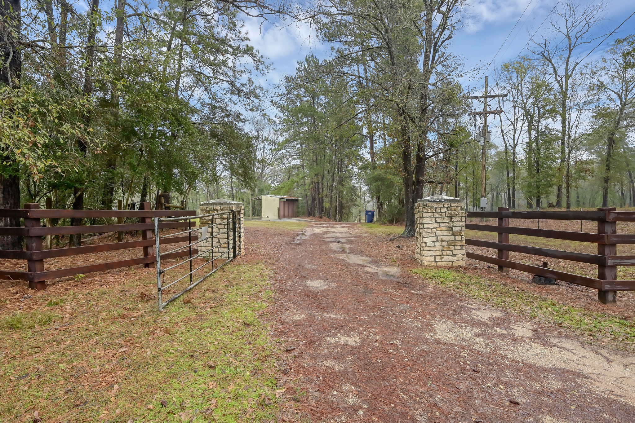 80 Nettie Phillips Road Coldspring, TX 77331 - Photo 2 of 49 Gated Entry, follow long drive down to the house.