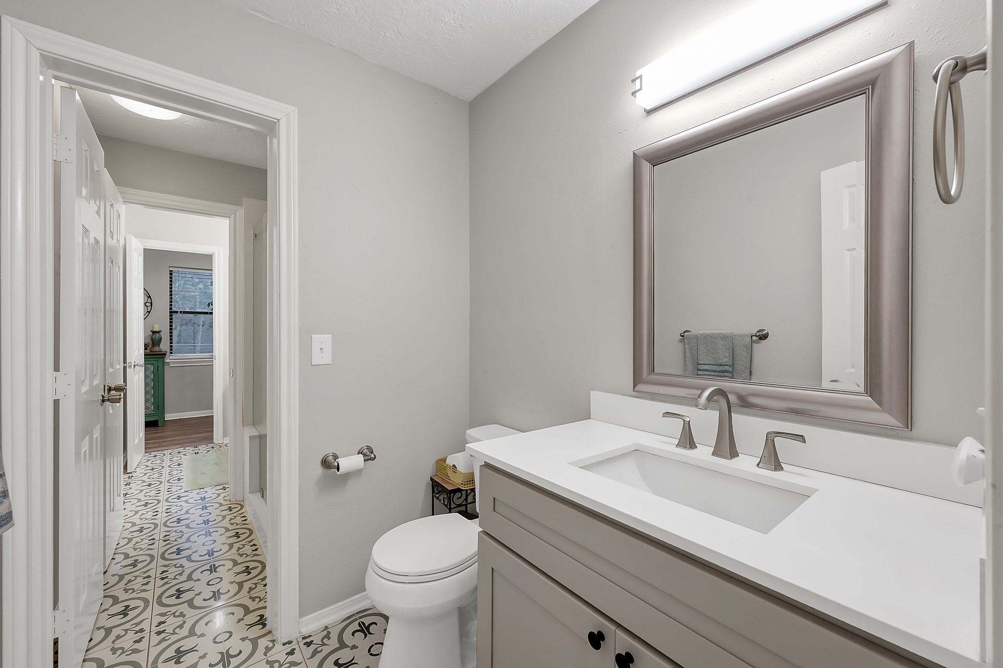 80 Nettie Phillips Road Coldspring, TX 77331 - Photo 29 of 49 Upstairs Bath with single sink, progressing to a generous shower, ending at a large vanity.