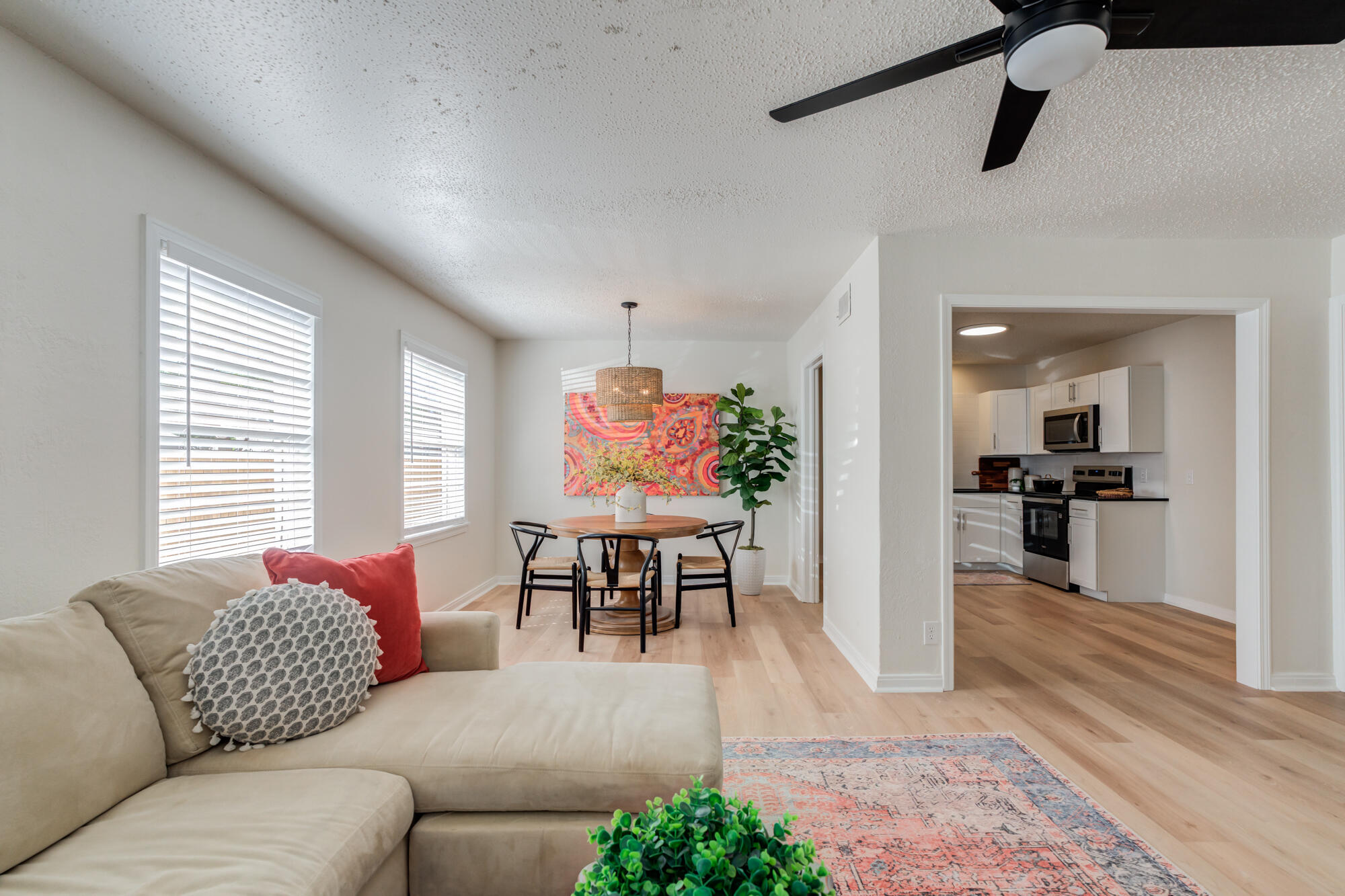3610 30th Street Lubbock, TX 79410 - Photo 12 of 35 a living room with furniture and a window