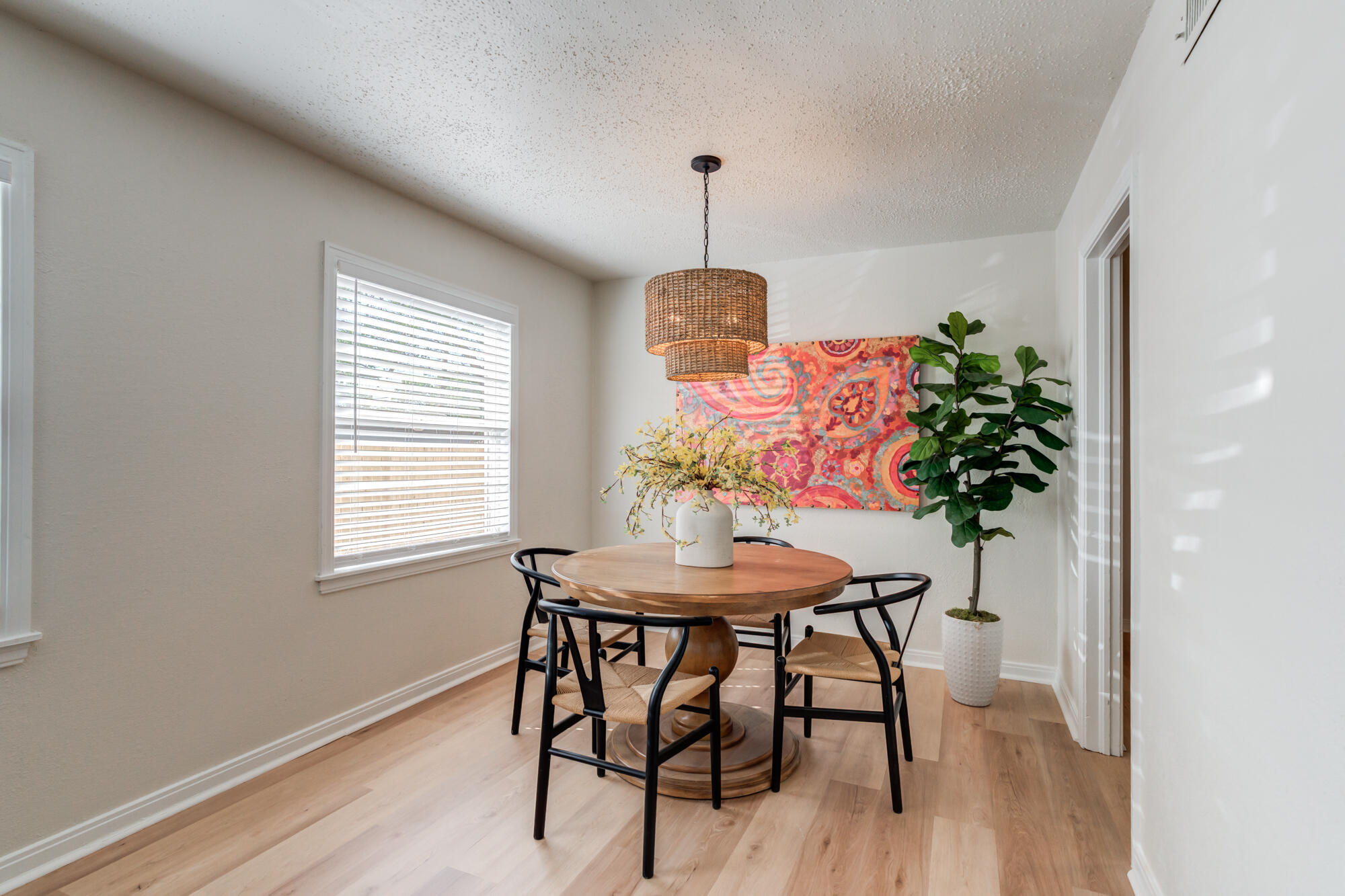 3610 30th Street Lubbock, TX 79410 - Photo 14 of 35 a dining room with furniture and window