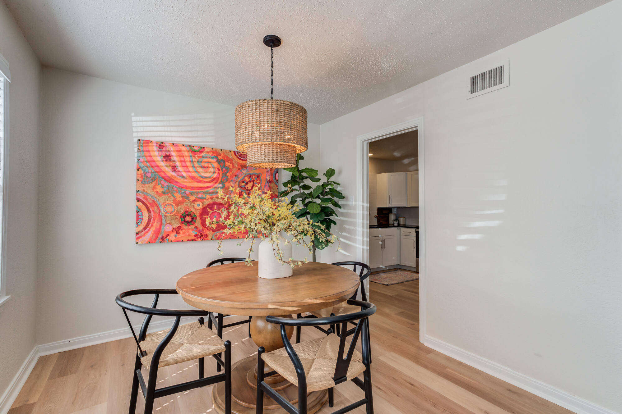 3610 30th Street Lubbock, TX 79410 - Photo 15 of 35 a dining room with furniture and wooden floor