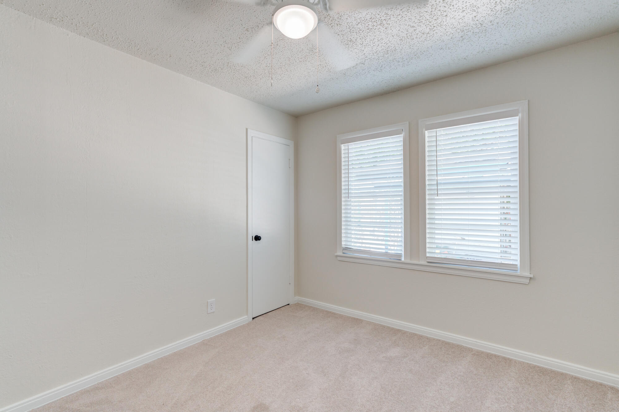 3610 30th Street Lubbock, TX 79410 - Photo 33 of 35 an empty room with a window