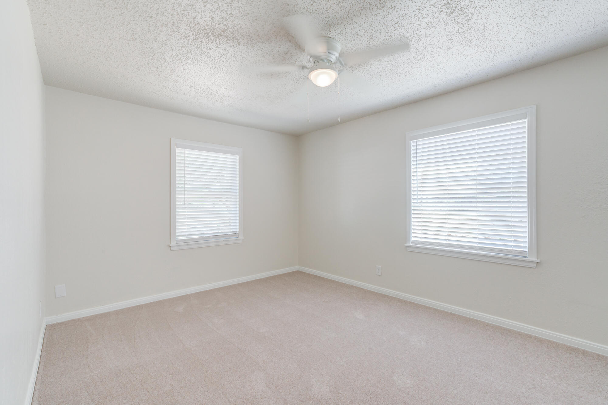 3610 30th Street Lubbock, TX 79410 - Photo 34 of 35 an empty room with a window
