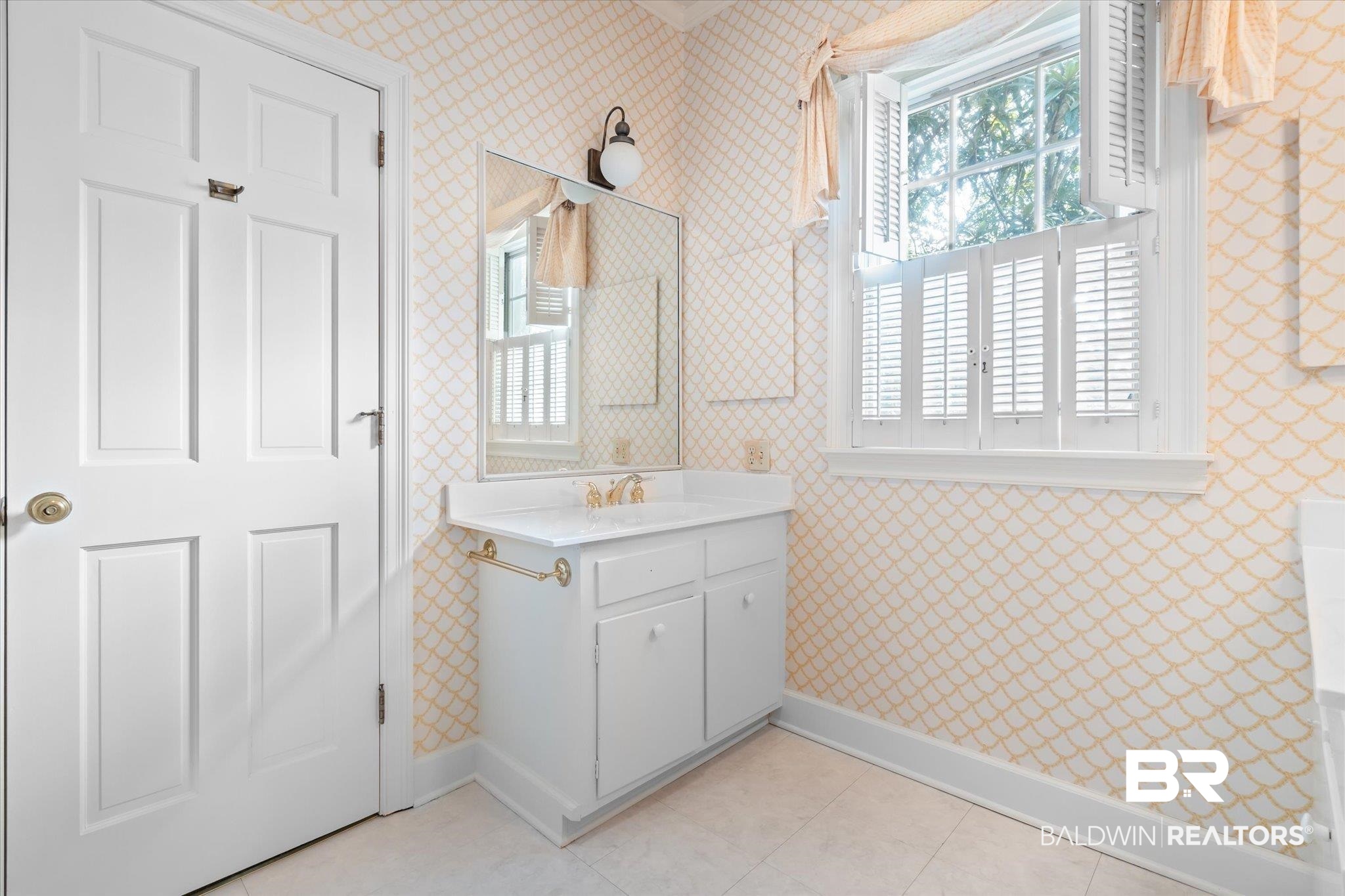 54 Turnin Lane Mobile, AL 36608 - Photo 24 of 35 Bathroom featuring vanity, plenty of natural light, and tile patterned floors