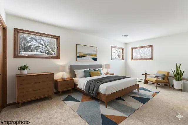 a bedroom with a bed and furniture