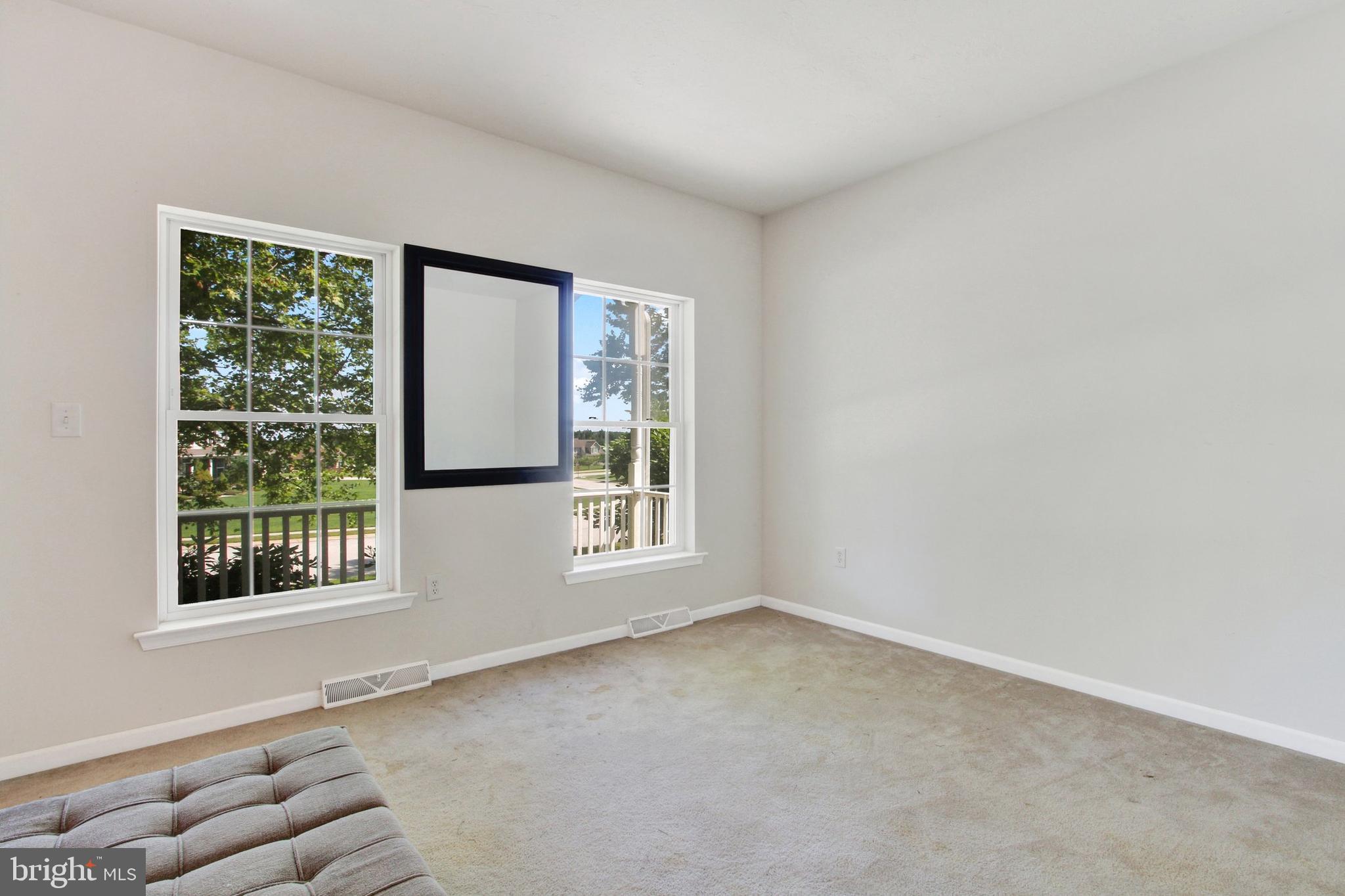 165 Ridgewood Drive Hanover, PA 17331 - Photo 4 of 28 an empty room with windows