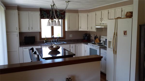 117 Mohawk Drive Seekonk, MA 02771 - Photo 1 of 16 a kitchen with a refrigerator and a sink