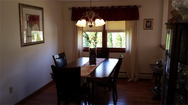 117 Mohawk Drive Seekonk, MA 02771 - Photo 2 of 16 a view of a dining room with furniture window and outside view