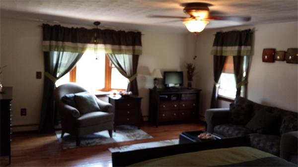 117 Mohawk Drive Seekonk, MA 02771 - Photo 4 of 16 a living room with furniture and a window