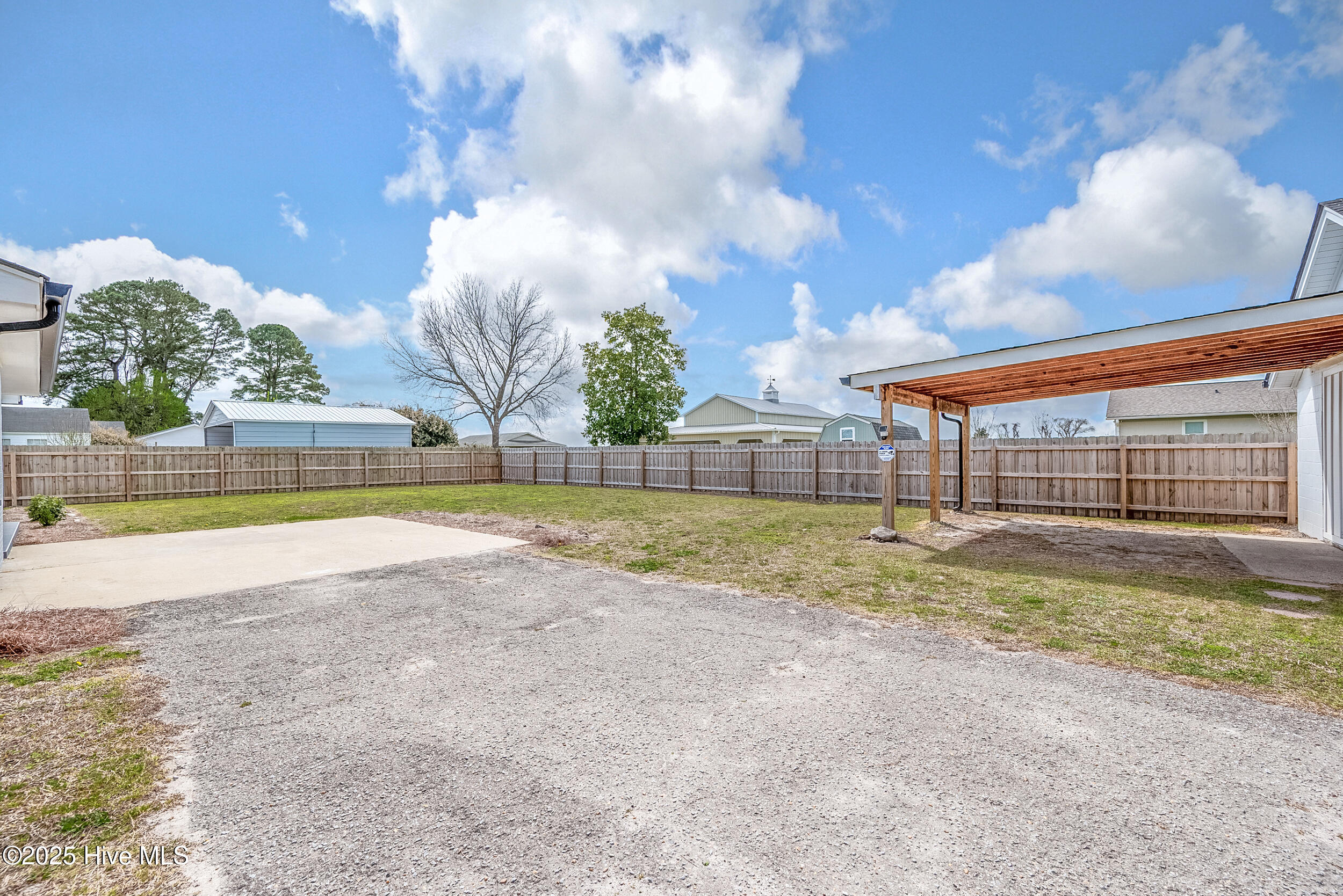 750 Shawboro Road Shawboro, NC 27973 - Photo 42 of 42 driveway area, concrete pad off patio and covered area of workshop