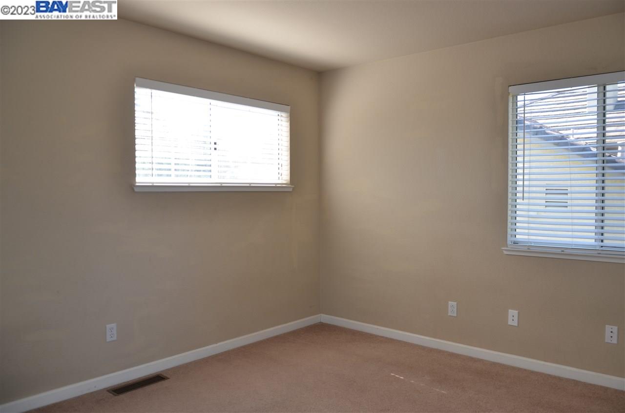 1463 Egret Drive Tracy, CA 95376 - Photo 12 of 19 an empty room with a window