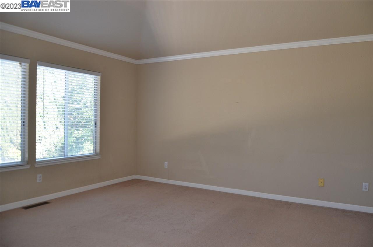 1463 Egret Drive Tracy, CA 95376 - Photo 15 of 19 an empty room with a window