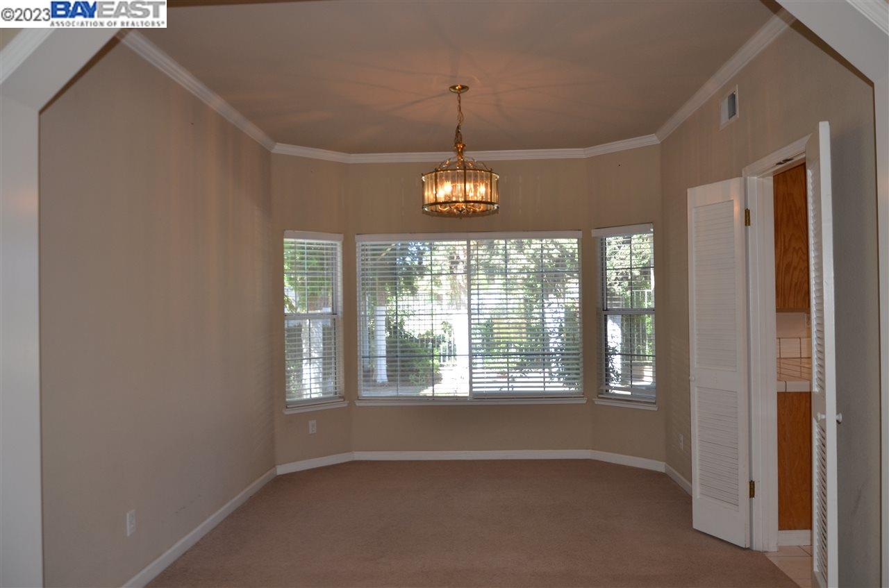 1463 Egret Drive Tracy, CA 95376 - Photo 9 of 19 a view of an empty room with a window