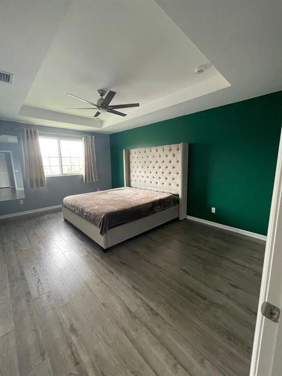 7445 Sarentino Lane, Unit 219 Boynton Beach, FL 33437 - Photo 5 of 12 a spacious bedroom with a bed and a window