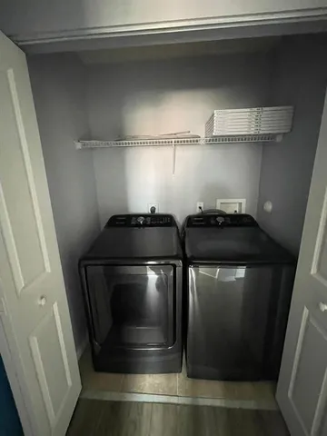 a close view of shoes stand and cabinets