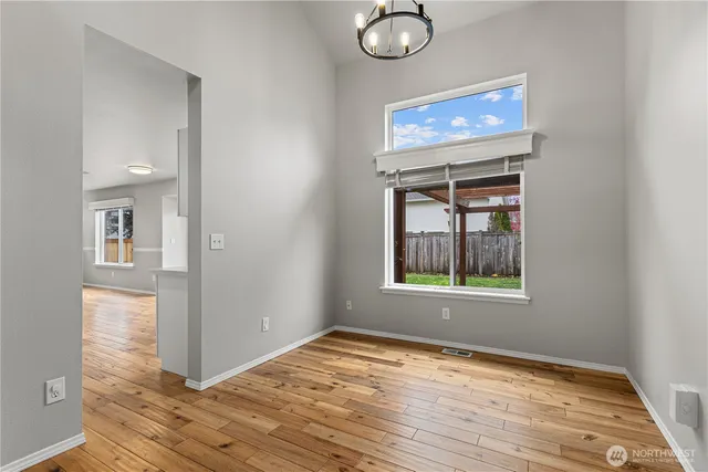 a view of a workspace with furniture