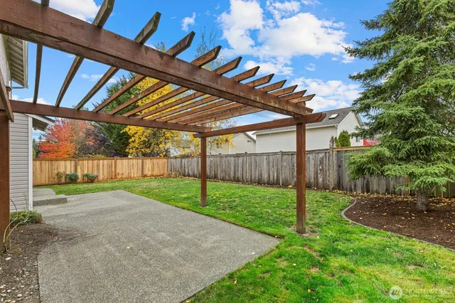 a view of a backyard with a garden