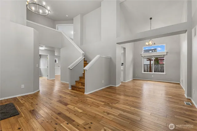 a view of a livingroom with wooden floor
