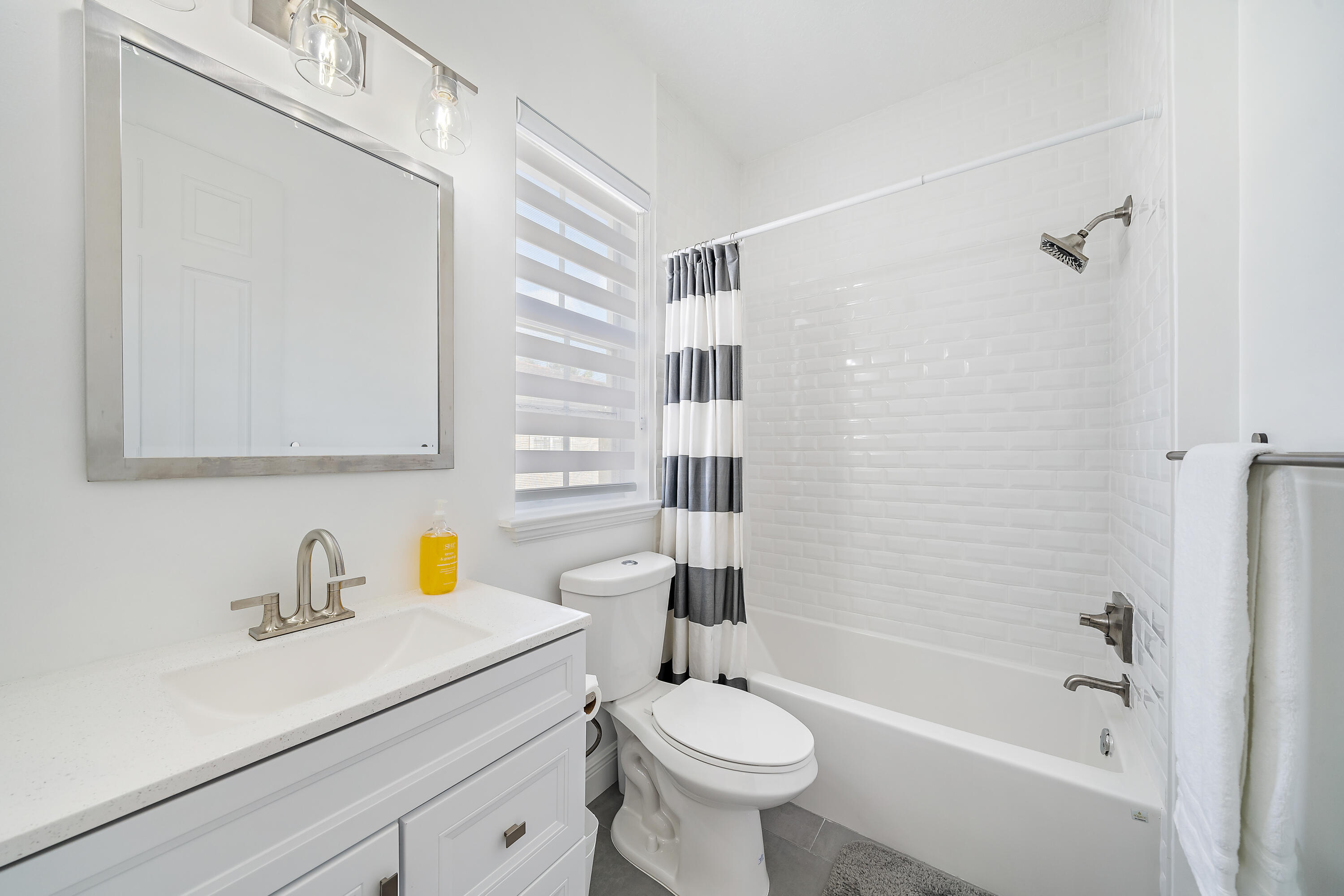 113 West Indian Crossing Circle Jupiter, FL 33458 - Photo 33 of 35 a bathroom with a sink toilet and shower