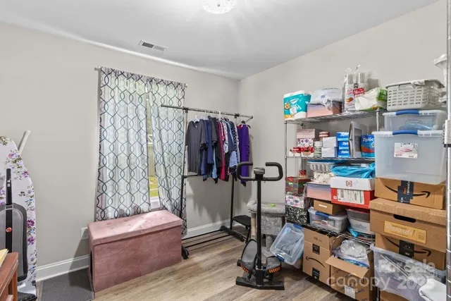 a view of a workspace with furniture and toys