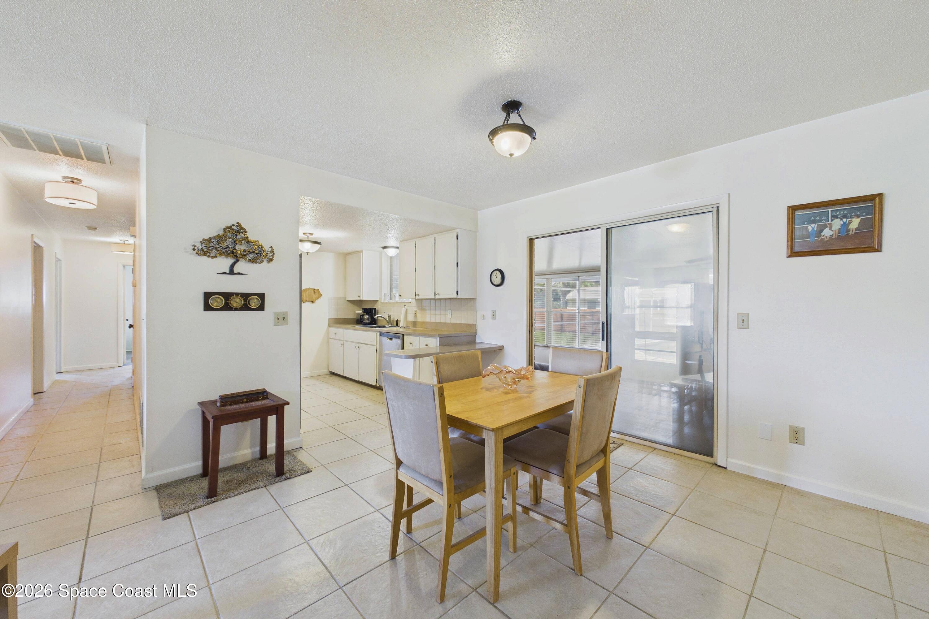 2620 Woodland Drive Edgewater, FL 32141 - Photo 5 of 24 3237e8084fb444bc87c382f35f661598_100_CAM