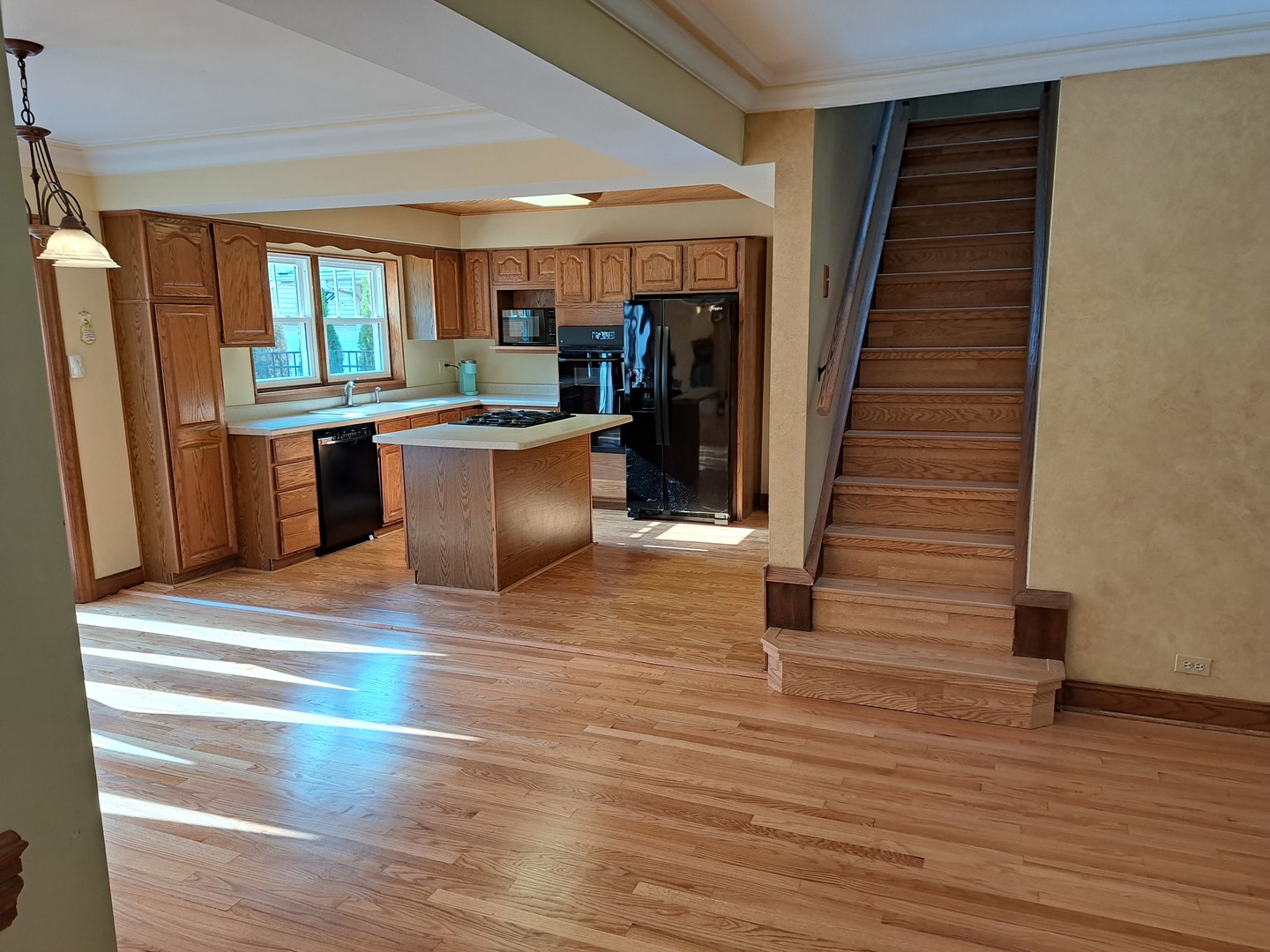 Undisclosed Address Park Ridge, IL 60068 - Photo 7 of 25 a kitchen view with wooden floor and stainless steel appliances