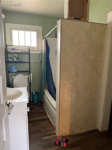 a bathroom with a sink and a shower