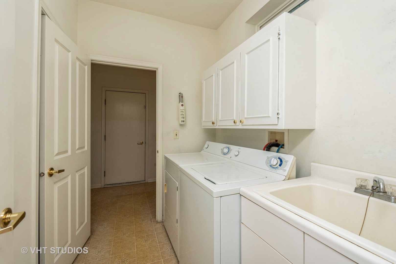 13065 Big Horn Drive Huntley, IL 60142 - Photo 14 of 14 a utility room with dryer and washer
