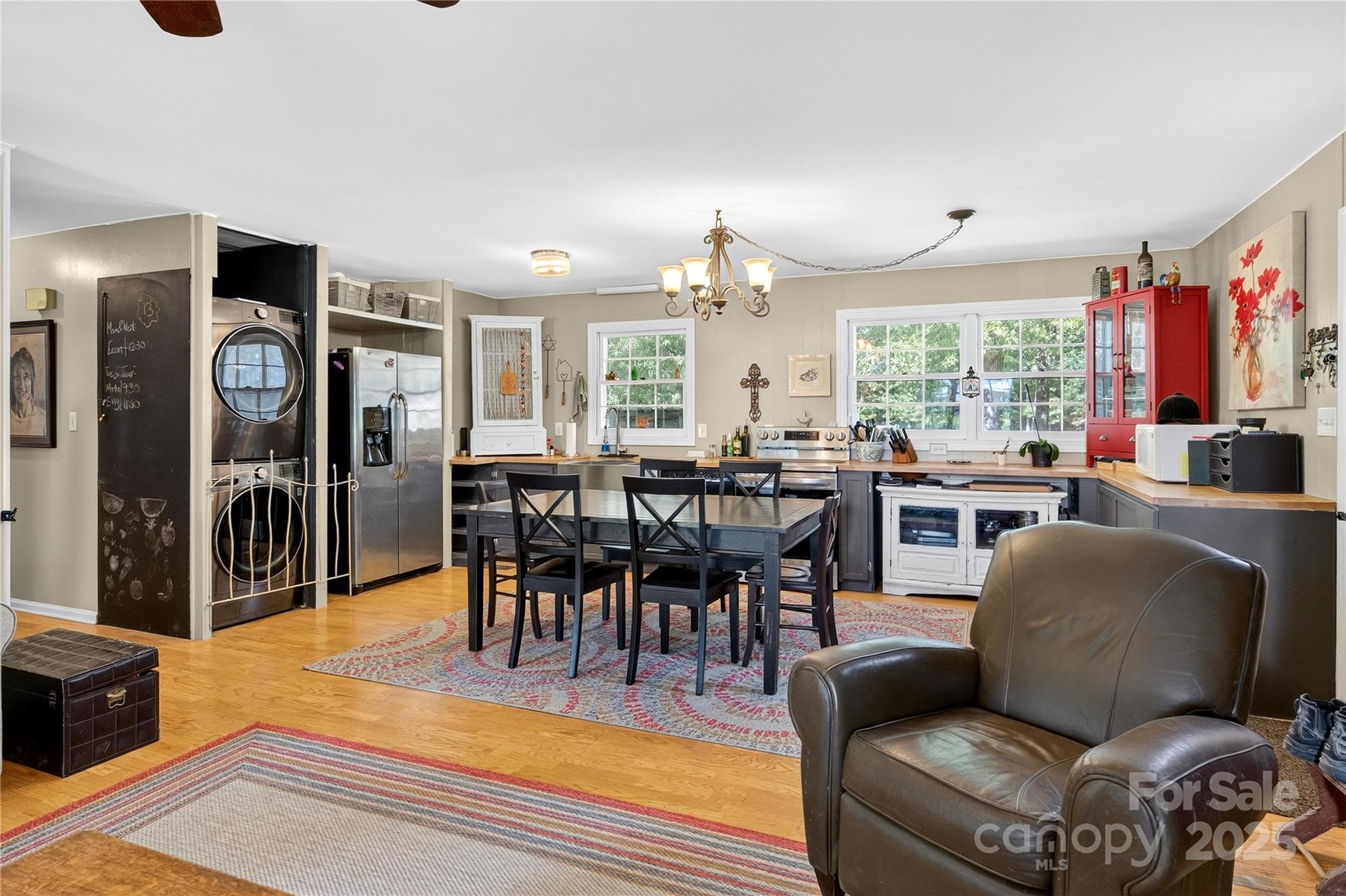 205 Airport Road Monroe, NC 28110 - Photo 22 of 32 a living room with furniture dining area and a large window