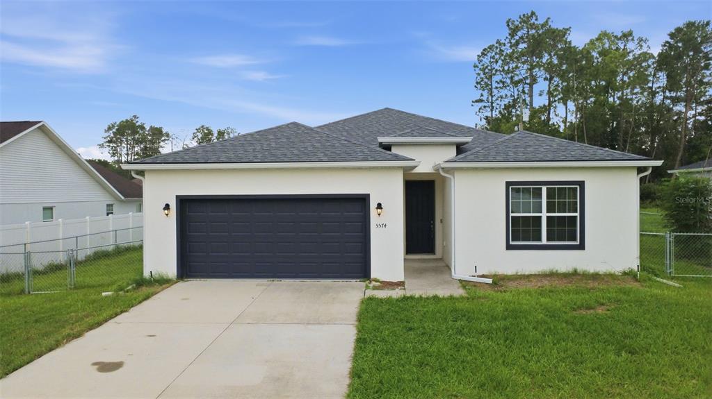 5574 Southwest 128th Place Ocala, FL 34473 - Photo 1 of 62