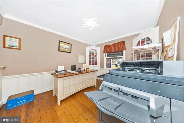 a view of a kitchen with a sink and a stove top oven