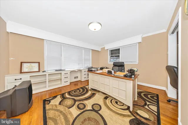 a view of a workspace with furniture