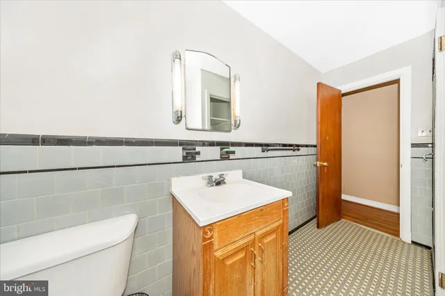 a view of a livingroom with furniture and a flat screen tv