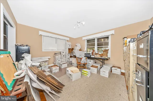 a view of a workspace with furniture