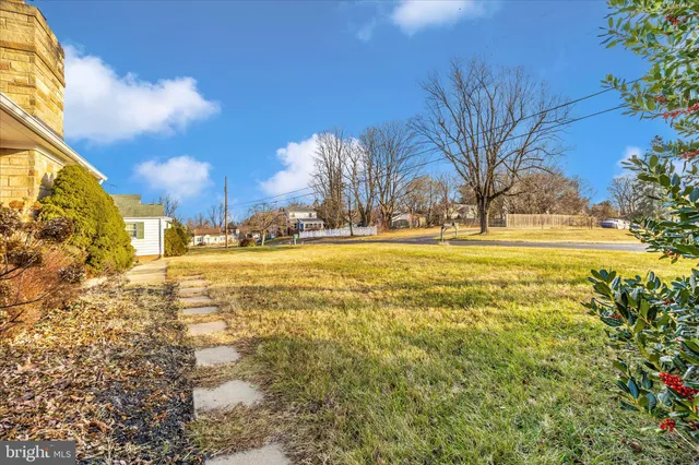 a view of a house with a big yard