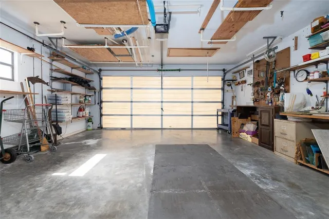 a view of a garage with storage
