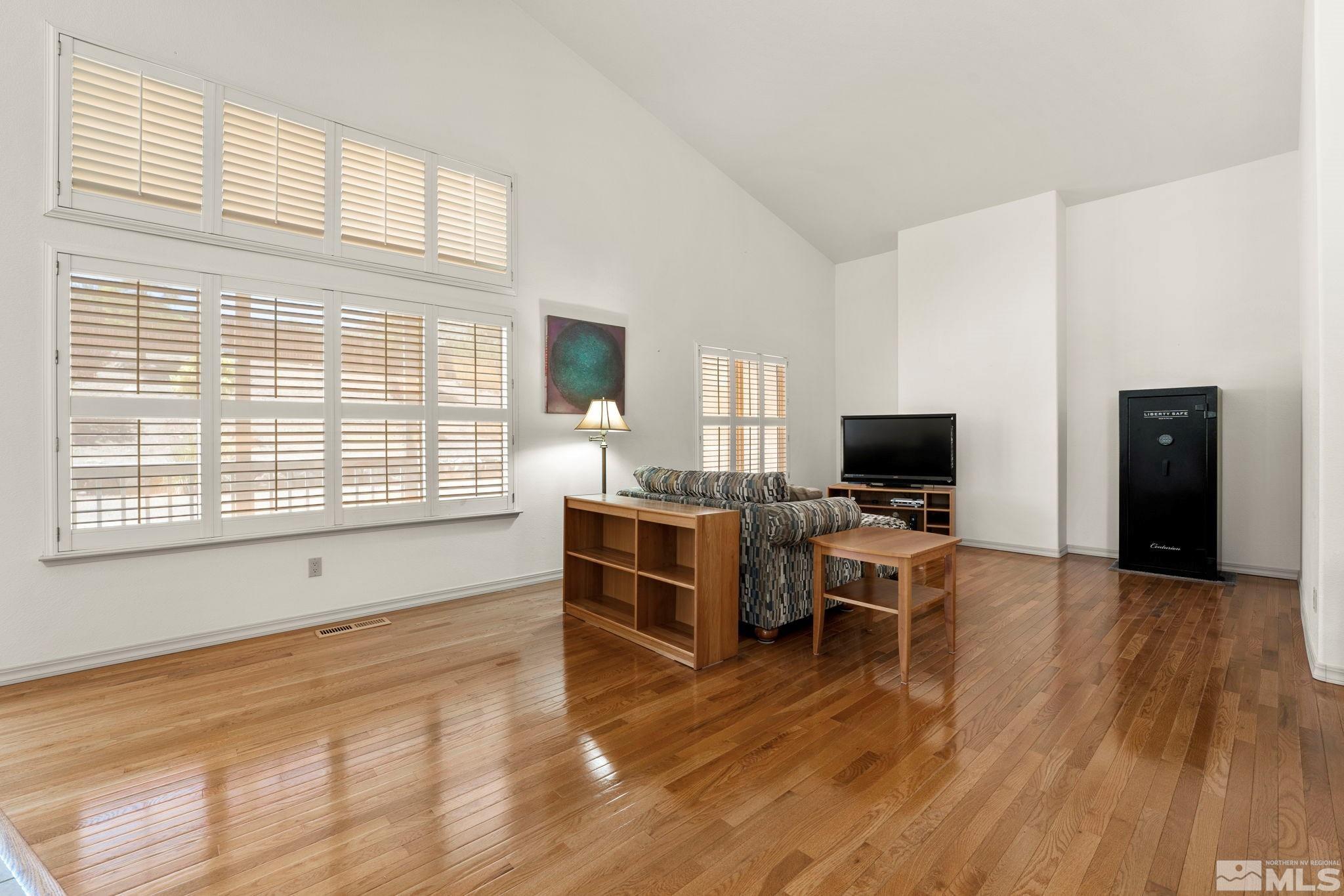 50 Deer Valley Court Reno, NV 89511 - Photo 12 of 39 a view of a livingroom with furniture and a flat screen tv