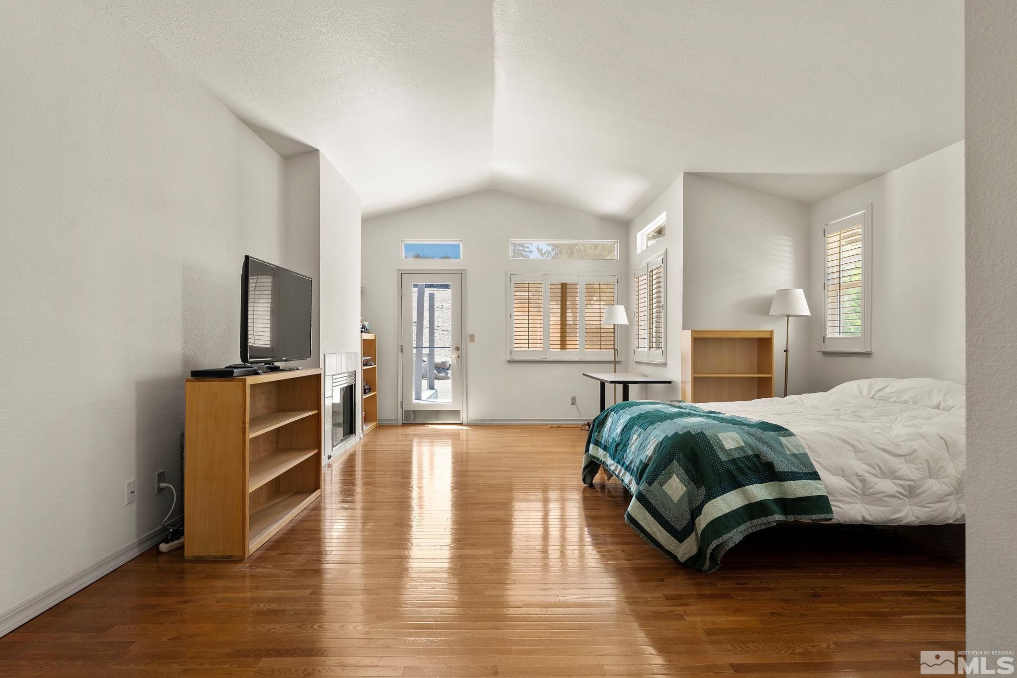 50 Deer Valley Court Reno, NV 89511 - Photo 18 of 39 a living room with furniture and a flat screen tv