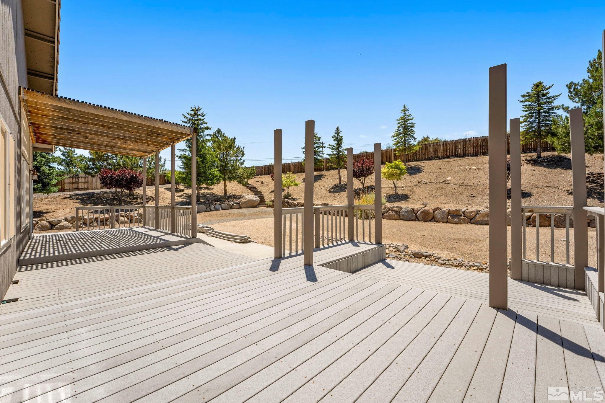 50 Deer Valley Court Reno, NV 89511 - Photo 30 of 39 a view of a balcony with wooden floor