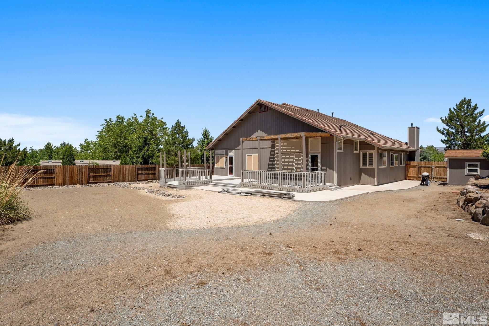 50 Deer Valley Court Reno, NV 89511 - Photo 33 of 39 a view of a house with a outdoor space
