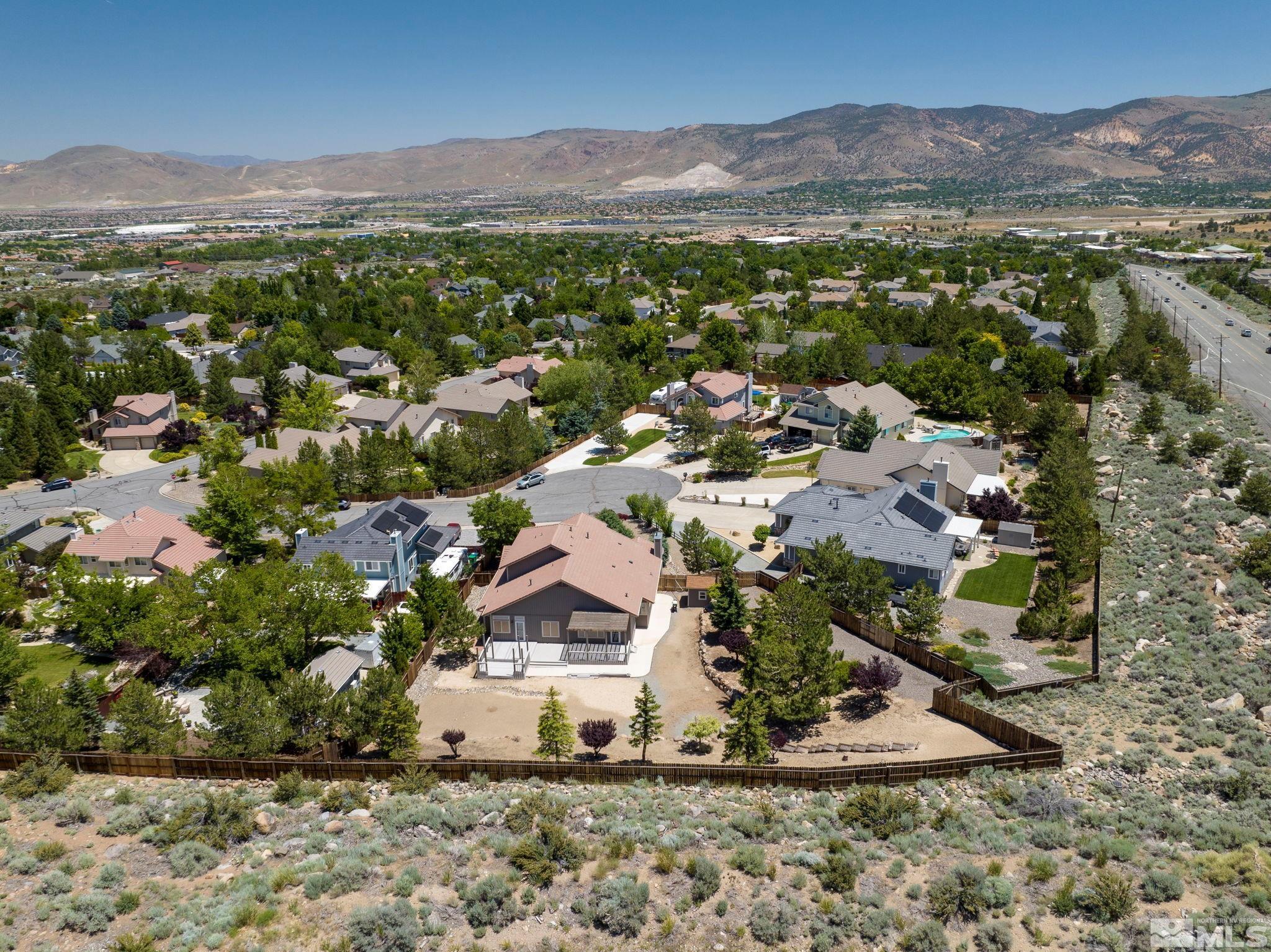 50 Deer Valley Court Reno, NV 89511 - Photo 36 of 39 a view of a house with a yard
